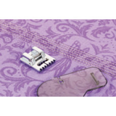 Sámková patka s 9 prohlubněmi pro šicí stroje do 7 mm Sámková patka s 9 prohlubněmi pro šicí stroje do 7 mm